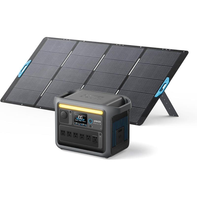 Estación de energía Anker SOLIX C1000 junto a un panel solar plegado en cuatro secciones con asas azules